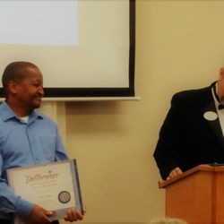 Roo Lan Health & Rehab - Zim Dube winning the award for Caregiver of the Year at the Annual Caregiver Recognition Dinner, October 2018