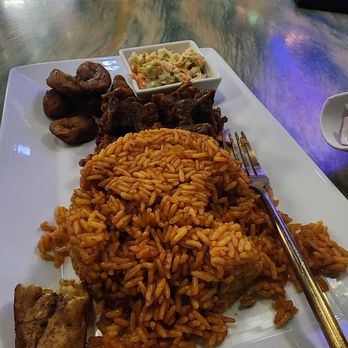 Aroma Ultra Lounge - Jollof rice with Goat - Lounges Near Me - Bowie, Maryland Aroma Ultra Lounge - Jollof rice with Goat - Lounges Near Me - Bowie, Maryland
