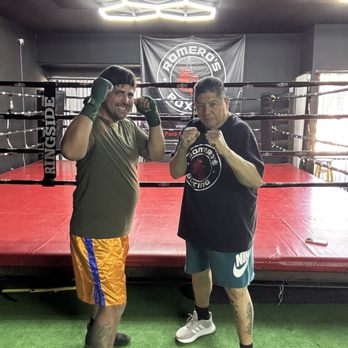 Romeros Boxing - Paco and I posing in front of the ring. - Trainers Near Me - San Bernardino , California Romeros Boxing - Paco and I posing in front of the ring. - Trainers Near Me - San Bernardino , California