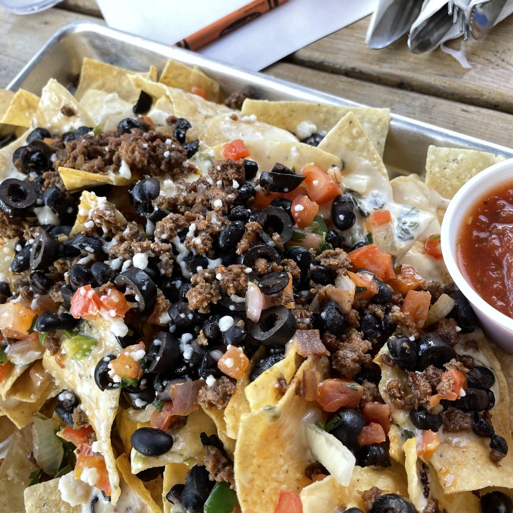 Johnny's Tavern - a tray of nachos - American Near Me - Shawnee, Kansas Johnny's Tavern - a tray of nachos - American Near Me - Shawnee, Kansas