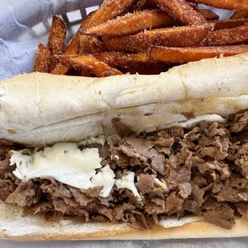 A Taste Of Philly - Some kind of processed cheese was placed on the roll, not mixed with the steak - Cheesesteaks Near Me - Garner, North Carolina A Taste Of Philly - Some kind of processed cheese was placed on the roll, not mixed with the steak - Cheesesteaks Near Me - Garner, North Carolina