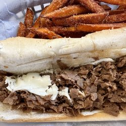 A Taste Of Philly - Some kind of processed cheese was placed on the roll, not mixed with the steak