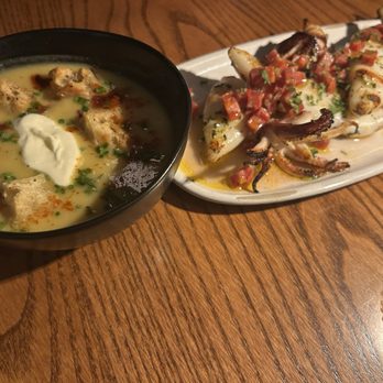 District Kitchen & Bar - Corn chowder and grilled calamari with  soppersata - New American Near Me - Pittsfield, Massachusetts