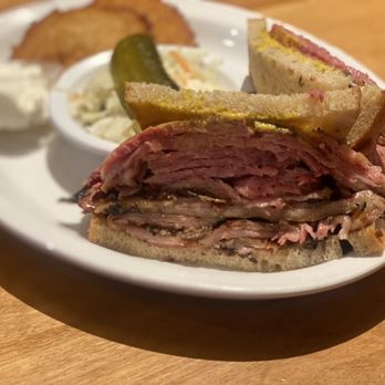 Dunn's - a roast beef sandwich with a side of coleslaw - Burgers Near Me - Montreal, Quebec Dunn's - a roast beef sandwich with a side of coleslaw - Burgers Near Me - Montreal, Quebec