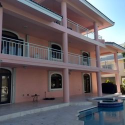 Keys Home Improvement - Exterior poolside before new color.