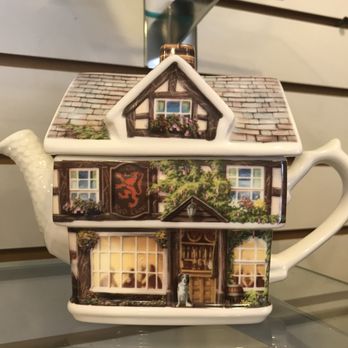 The English Shop - a teapot with a house on it - Specialty Food Near Me - Saint Charles, Missouri