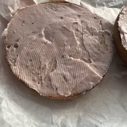 Bagel with strawberry cream cheese spread