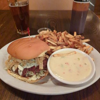 Tin Kitchen - Not on the menu, but single cheese burger, sun Bleu cheese and add onion straws. Fries with queso side - Barbeque Near Me - Weston, Missouri