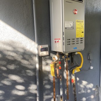Roy's Plumbing - New Tankless Water heater. - Plumbing Near Me