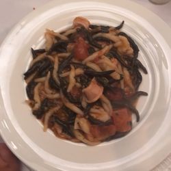 Ristorante Pepen - Handrolled Pasta w/Squid, Truffles served with Tomatoes