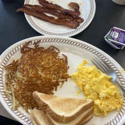 Scrambled eggs with cheese, toast, hash browns & toast with bacon Scrambled eggs with cheese, toast, hash browns & toast with bacon