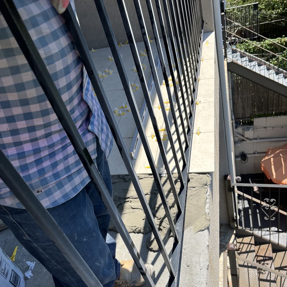 RH Construction USA - Tile is installed on an angle running off the balcony edge - General Contractors Near Me - Brooklyn, New York RH Construction USA - Tile is installed on an angle running off the balcony edge - General Contractors Near Me - Brooklyn, New York