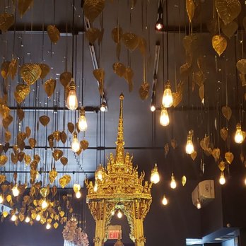 Phattra Thai Restaurant - Gold dining room centerpiece. - Thai Near Me - Metuchen, New Jersey Phattra Thai Restaurant - Gold dining room centerpiece. - Thai Near Me - Metuchen, New Jersey