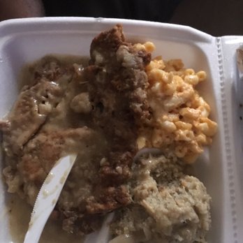 Ms Movale's Eatery - Fried pork chop with gravy , dressing , and mac and cheese - Soul Food Near Me - Riverdale, Georgia