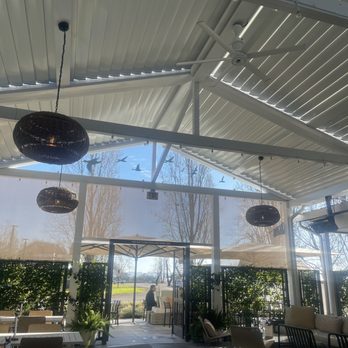 Migration Winery - covered patio seating - Wine Tasting Room Near Me - Napa, California Migration Winery - covered patio seating - Wine Tasting Room Near Me - Napa, California