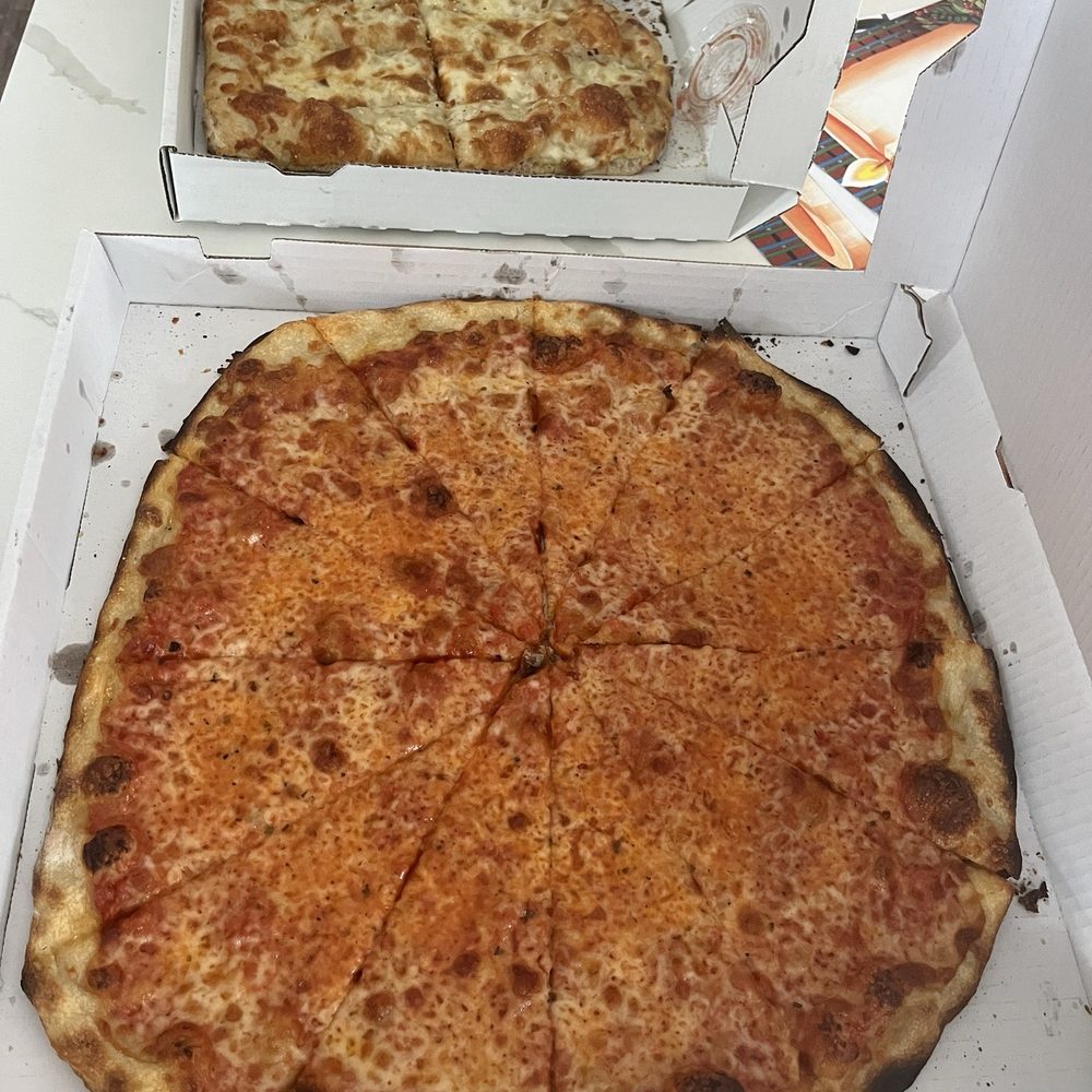 Large cheese pizza and cheese bread Large cheese pizza and cheese bread