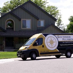 Southside Plumbing - Fully stocked van parked  next to a home.
