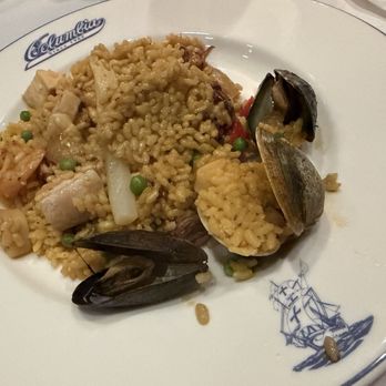 Columbia Restaurant - Paella "a la Valenciana" - Prepared in a traditional paella pan with La Bomba Spanish rice, extra-virgin olive oil. - Spanish Near Me - Tampa, Florida
