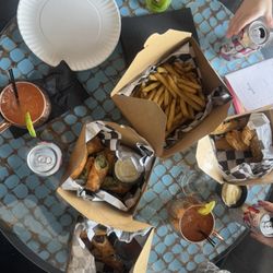 The Pizza Pit - Cheesesteak Eggrolls (3), Spinach n artichoke eggrolls (3), Chicken Fingers, small fries, Moscow mules