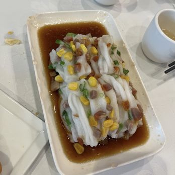 Happy Together - BBQ Pork & Corn Rice Roll. Unique presentation, but underwhelming. Difficult to separate the rice rolls and oversteamed. - Dim Sum Near Me - El Monte, California Happy Together - BBQ Pork & Corn Rice Roll. Unique presentation, but underwhelming. Difficult to separate the rice rolls and oversteamed. - Dim Sum Near Me - El Monte, California