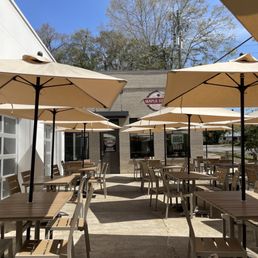 Outside, umbrella covered seating Outside, umbrella covered seating
