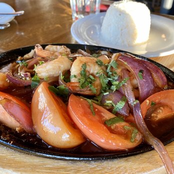 Puerto 27 Peruvian Kitchen & Pisco Bar - Trucha encebollada - trout - Peruvian Near Me - Pacifica, California Puerto 27 Peruvian Kitchen & Pisco Bar - Trucha encebollada - trout - Peruvian Near Me - Pacifica, California