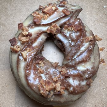 JM Bakery - a glazed donut with nuts on top - Bakeries Near Me - New York, New York JM Bakery - a glazed donut with nuts on top - Bakeries Near Me - New York, New York