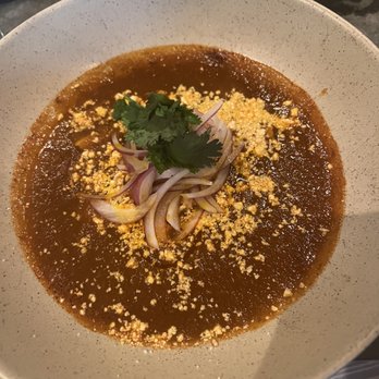 La Condesa - ENTOMATADAS braised chicken, tomato broth, epazote, cotija - Mexican Near Me - Austin, Texas La Condesa - ENTOMATADAS braised chicken, tomato broth, epazote, cotija - Mexican Near Me - Austin, Texas