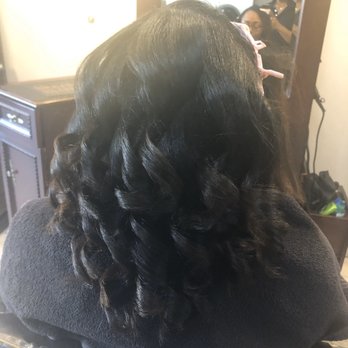 Galaxy Evolution Hair Designers - Nelsa wanted to show me the back of my hair which I really loved! It didn't last though and my hair got heat damage all around - Hair Extensions Near Me - Brooklyn, New York