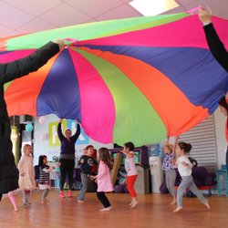 Parachute time during a birthday party at H2K - so much FUN!!