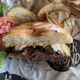 Char-Cheese Burger with cheese and wing chips Char-Cheese Burger with cheese and wing chips