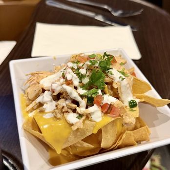 Studio Movie Grill - 1/2 nachos - Cinema Near Me - Houston, Texas Studio Movie Grill - 1/2 nachos - Cinema Near Me - Houston, Texas