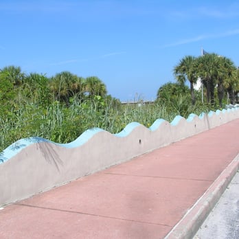 Upham Beach - Walkway and wall adjacent to Upham Beach parking area - Beaches Near Me - Saint Pete Beach, Florida