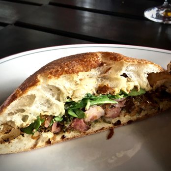 Branch Line - PORCHETTA SANDWICH: With dill mustard, arugula, pickled onions on Iggy's bread ($12) - New American Near Me - Watertown, Massachusetts Branch Line - PORCHETTA SANDWICH: With dill mustard, arugula, pickled onions on Iggy's bread ($12) - New American Near Me - Watertown, Massachusetts