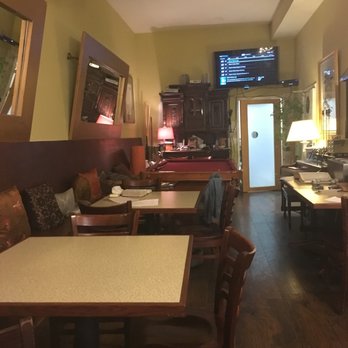 It's All About Grits - a restaurant with tables and chairs - Breakfast & Brunch Near Me - Oakland, California