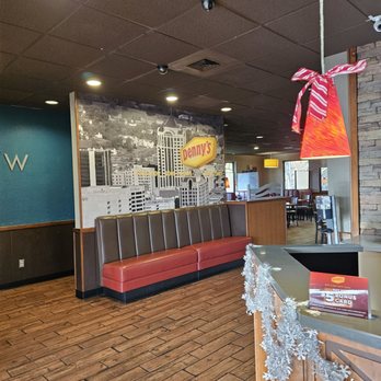 Denny's - The Host's station up front and the waiting area in the background provide a comfortable environment in which customers can wait. - Breakfast & Brunch Near Me - Roanoke, Virginia