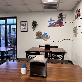 Kitchenfinity - a dining room with a table and chairs - Desserts Near Me - Norfolk, Virginia Kitchenfinity - a dining room with a table and chairs - Desserts Near Me - Norfolk, Virginia
