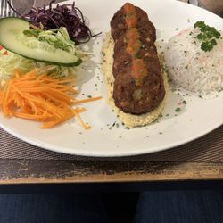Pasha - Falafels with salad and rice on a bed of hummus