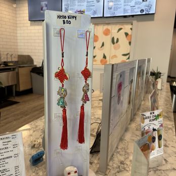 Milk Cha-Cha - Hello Kitty keychains! - Bubble Tea Near Me - Charlotte, North Carolina