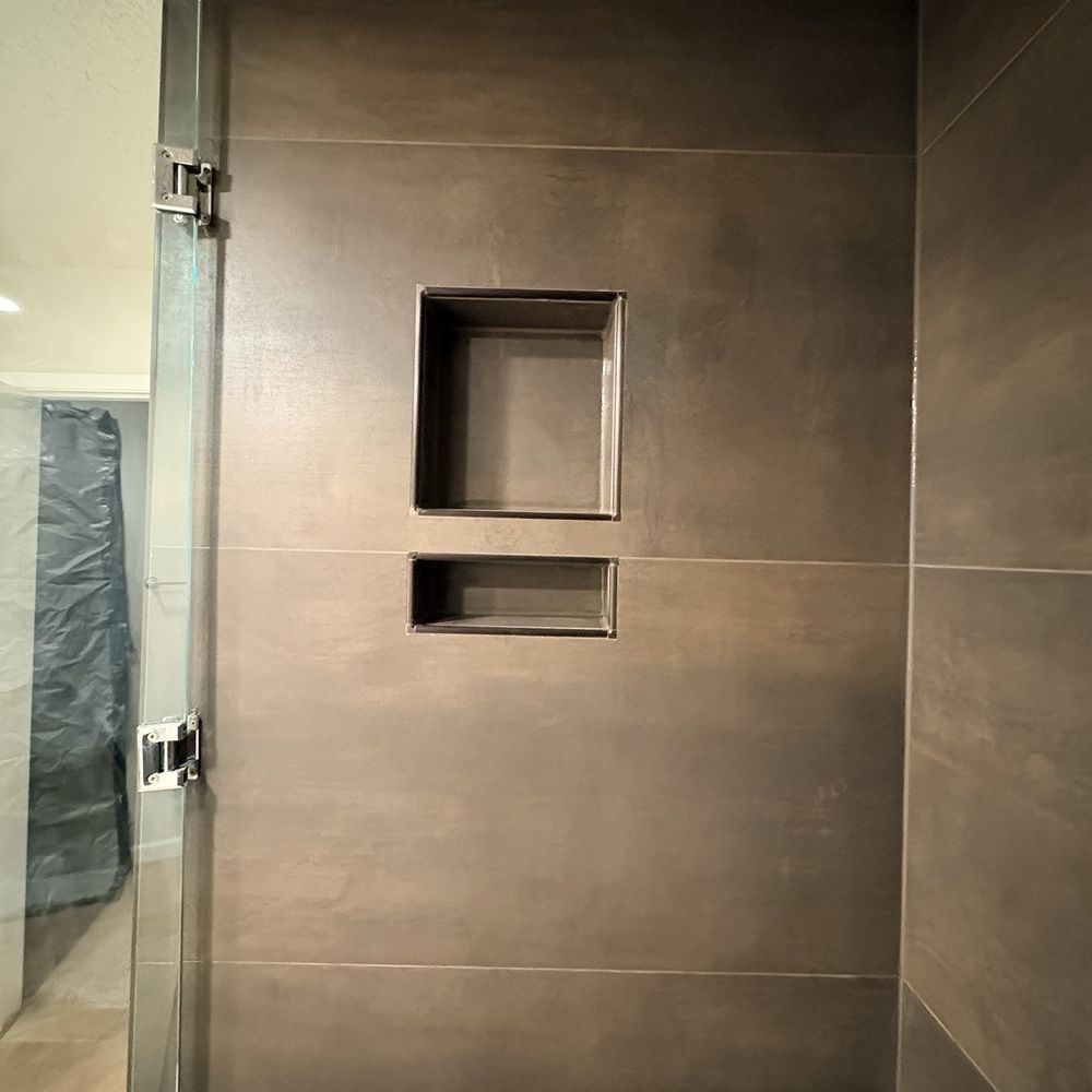 Cjj Remodeling - Schluter Shower shelf w/bronze trim. - General Contractors Near Me - Dallas, Texas Cjj Remodeling - Schluter Shower shelf w/bronze trim. - General Contractors Near Me - Dallas, Texas