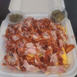 Hogz N Henz R Up N Smoke - Pulled pork nachos with cheese and BBQ sauce