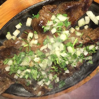 Bodeguita Express - beef and onions in a skillet - Salvadoran Near Me - Union City, New Jersey Bodeguita Express - beef and onions in a skillet - Salvadoran Near Me - Union City, New Jersey