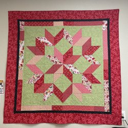 Temple Sew And Quilt - A quilt on the wall. Great shop for supplies.