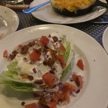 The Stockyard Restaurant - Wedge Salad and skillet potatoes - Bars Near Me - Brighton, Massachusetts The Stockyard Restaurant - Wedge Salad and skillet potatoes - Bars Near Me - Brighton, Massachusetts