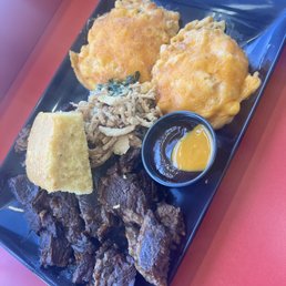 Brisket dinner * loaded mac n cheese, cornbread, side of slaw underneath, some extra dipping BBQ sauce and scrumptious beef brisket! Brisket dinner * loaded mac n cheese, cornbread, side of slaw underneath, some extra dipping BBQ sauce and scrumptious beef brisket!