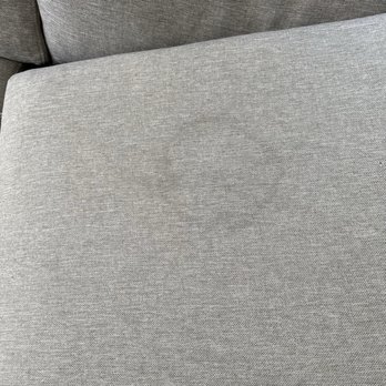 Bello Express Carpet Care - Before: stain on our couch - Carpet Cleaning Near Me - Chula Vista, California