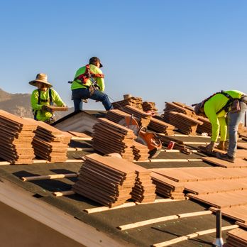Behmer Roofing & Sheet Metal - Our roofing team carefully re-installs tiles after new underlayment is in place. - Roofing Near Me - Scottsdale, Arizona Behmer Roofing & Sheet Metal - Our roofing team carefully re-installs tiles after new underlayment is in place. - Roofing Near Me - Scottsdale, Arizona