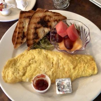 Michael's Grill - Cheddar omelet w/ gluten free bread - Seafood Near Me - Tampa, Florida Michael's Grill - Cheddar omelet w/ gluten free bread - Seafood Near Me - Tampa, Florida