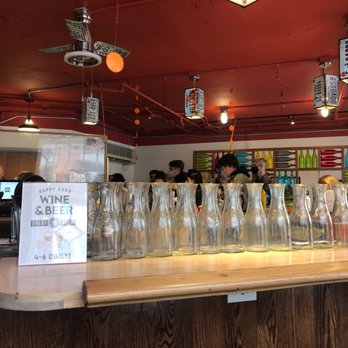 Collegetown Bagels - a bar with a lot of bottles on it - Bagels Near Me - Ithaca, New York Collegetown Bagels - a bar with a lot of bottles on it - Bagels Near Me - Ithaca, New York
