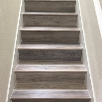 Integrity Laminate Flooring - a close up of a staircase - Flooring Near Me - Ocoee, Florida Integrity Laminate Flooring - a close up of a staircase - Flooring Near Me - Ocoee, Florida